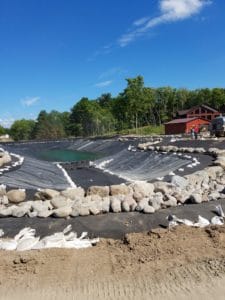 glacial-boulders-around-large-pond